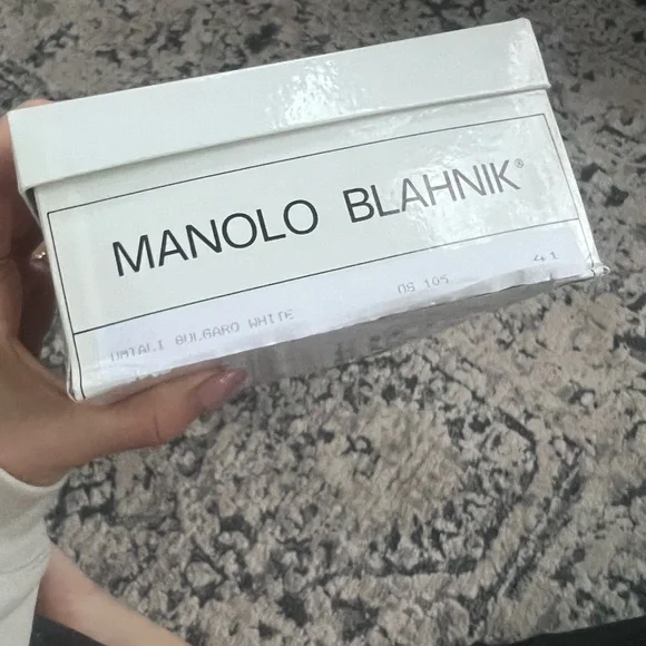 Manolo sandals size 41/11 in white.Perfect condition-comes with box and dust bag